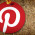 Pinterest logo on a board