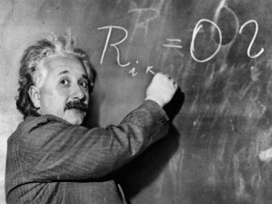 Make Money as Infopreneur Einstein writing on a blackboard