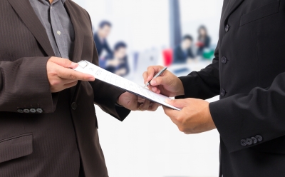Business Man Signing Contract